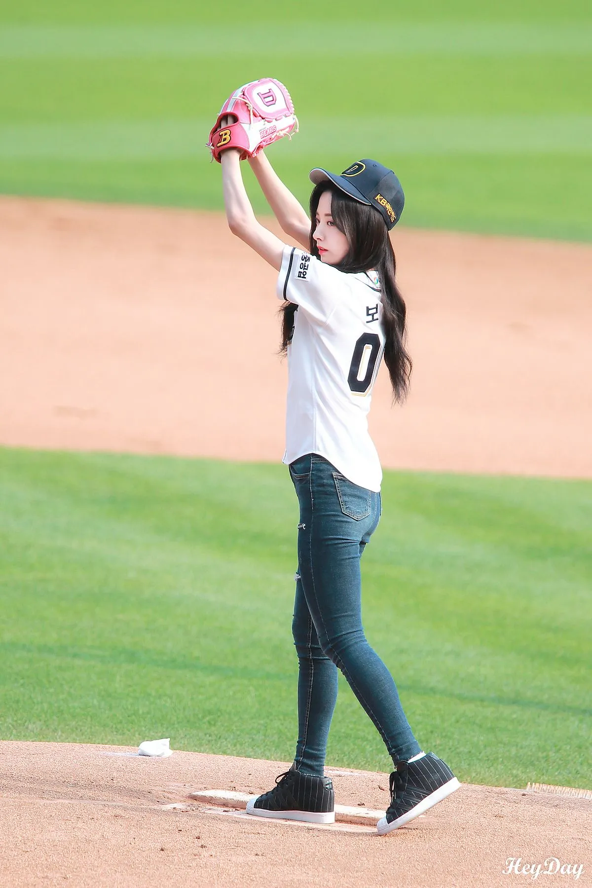 IU throws the opening pitch for the Doosan Bears