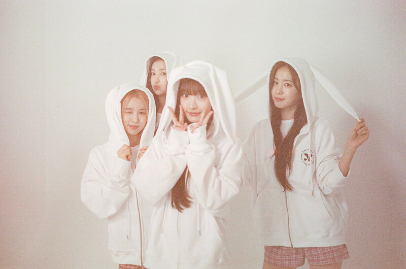 240403 WOOAH twitter update - Blush Concept photo behind documents 4