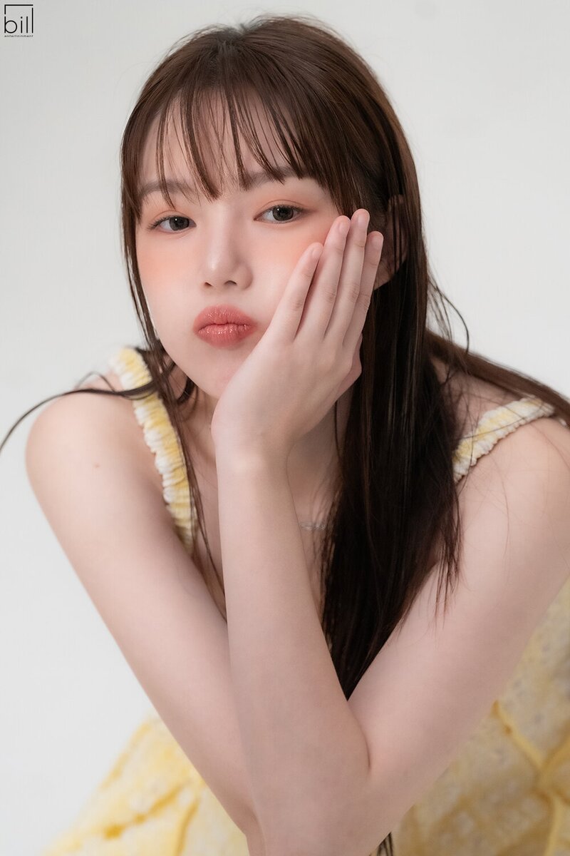 230901 Bill Entertainment Naver Post - YERIN for 'Star1 Magazine' behind documents 15