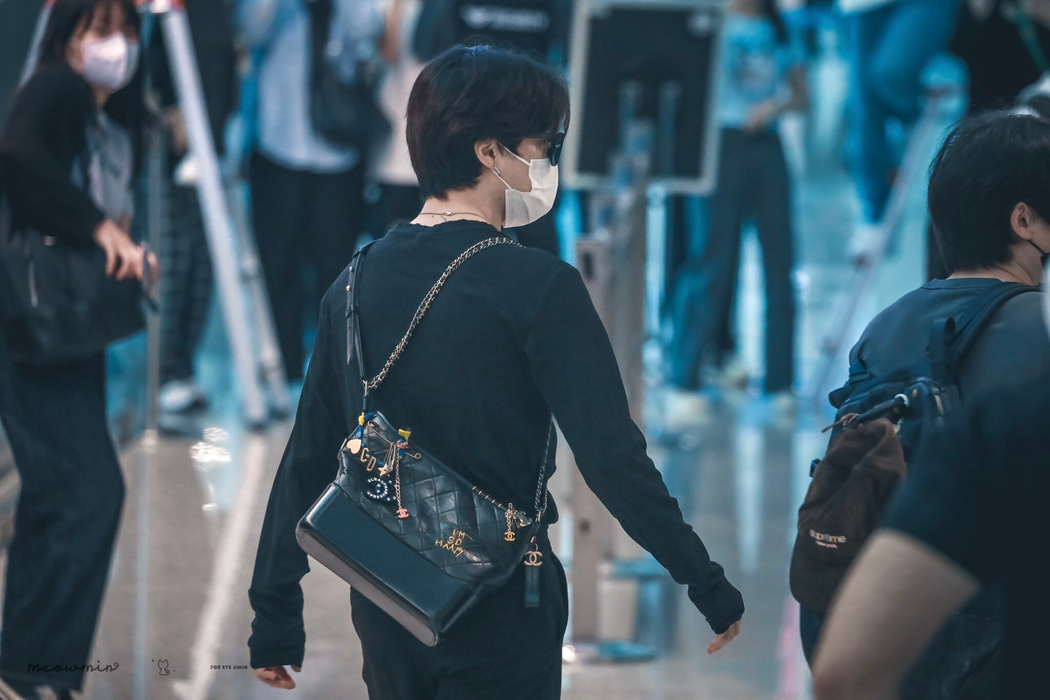 BTS' Jimin poses at airport before departure